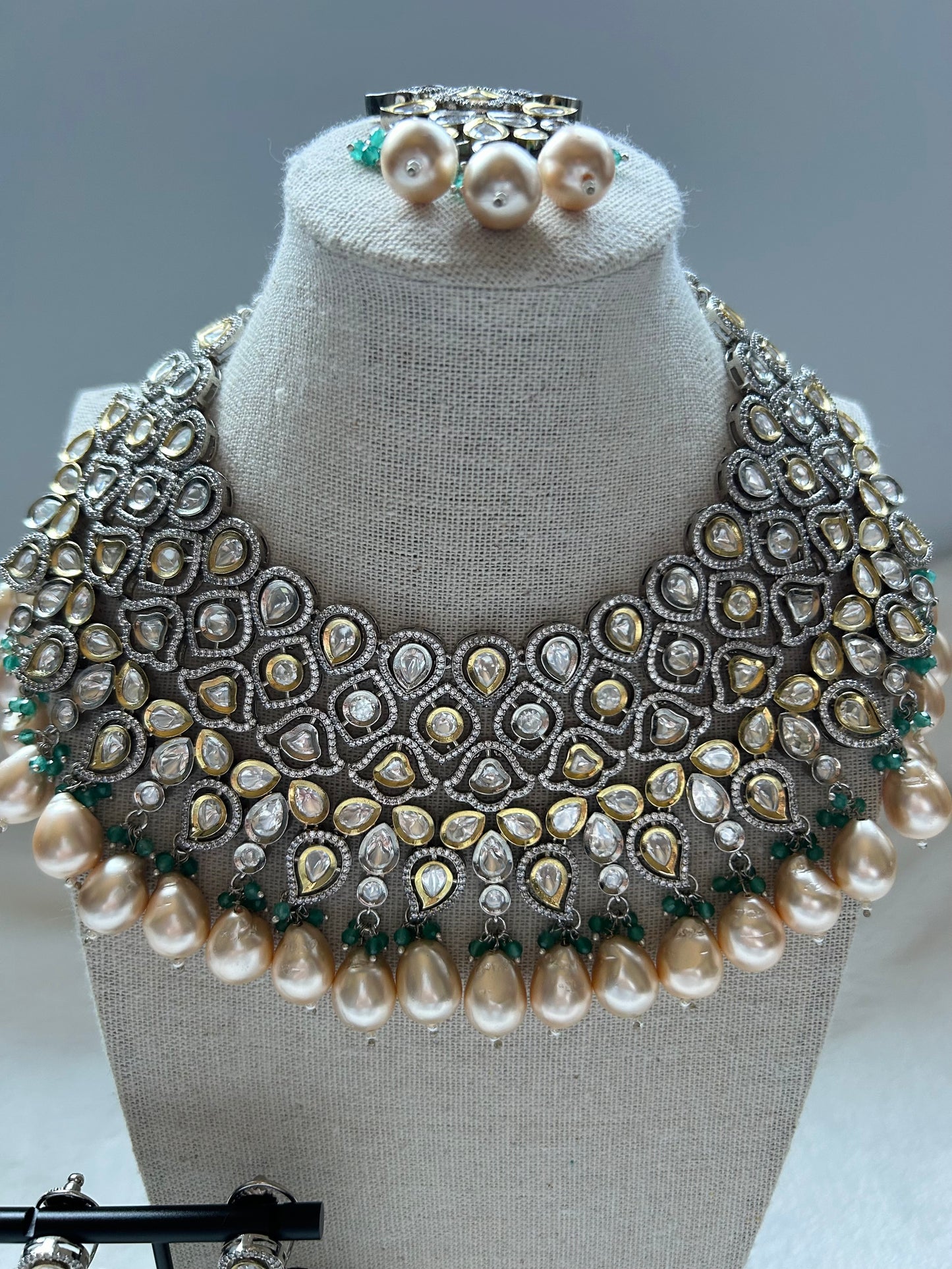 Tyaani Kundan Cream & Teal Bridal Set